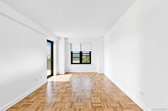 a view of an empty room and window