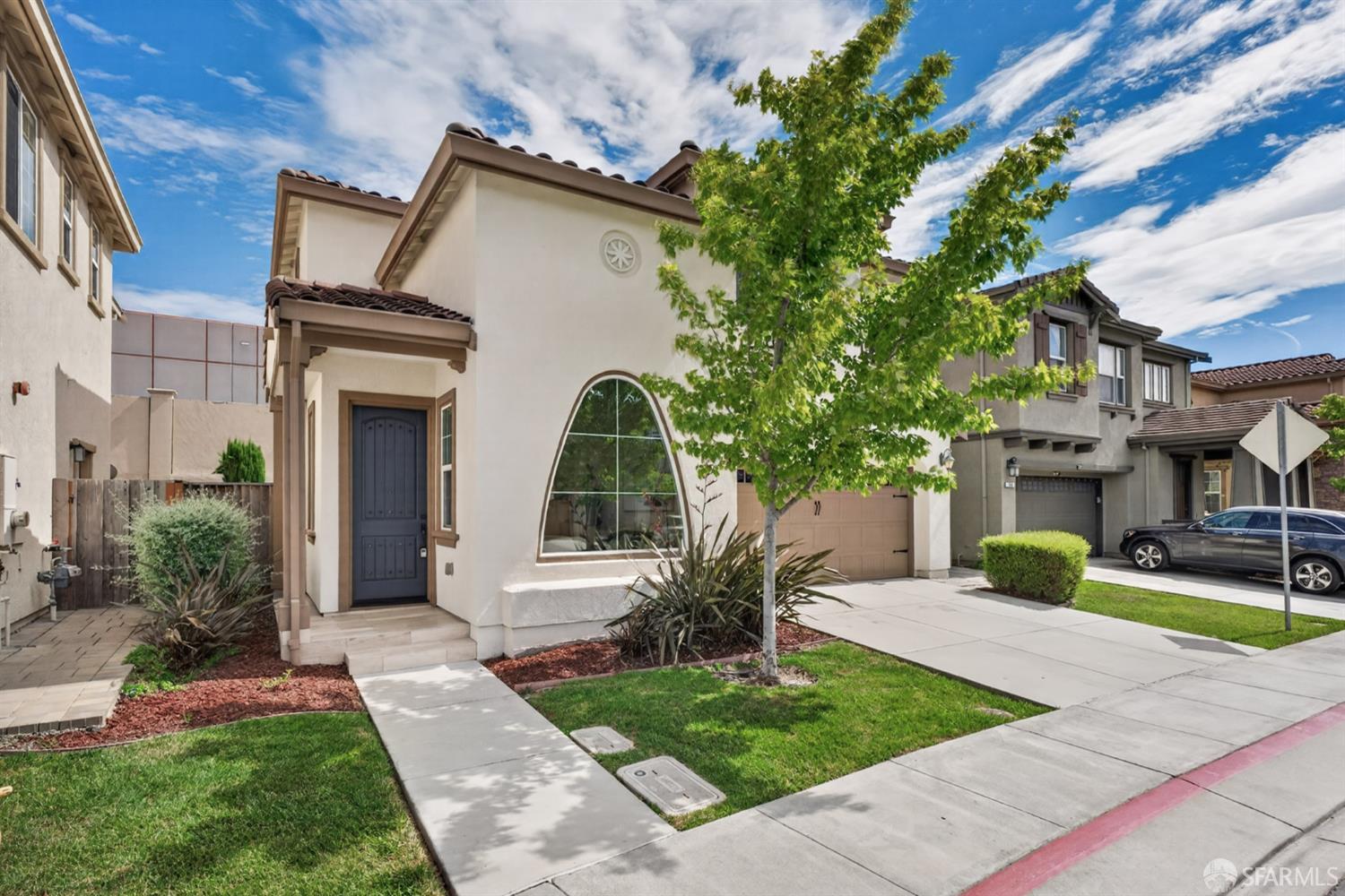 360 Gerald Circle Milpitas, CA 95035 - Photo 46 of 46 a front view of a house with a yard and potted plants