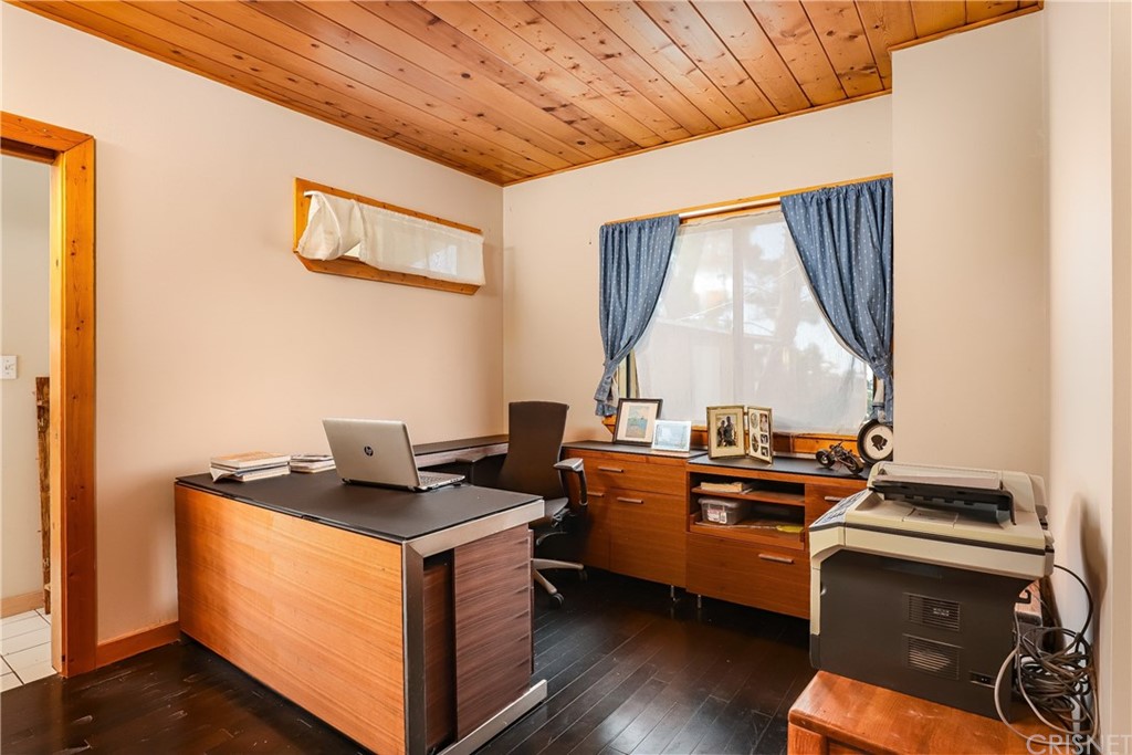 21123 Fort Tejon Road Llano, CA 93544 - Photo 13 of 55 a kitchen with stainless steel appliances granite countertop a stove a sink and a microwave