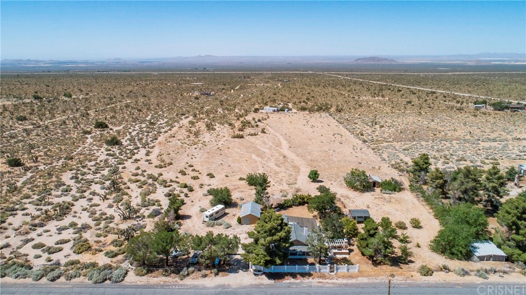 21123 Fort Tejon Road Llano, CA 93544 - Photo 25 of 55 an aerial view of residential building and ocean