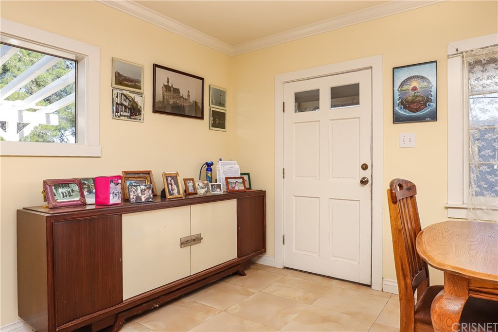 21123 Fort Tejon Road Llano, CA 93544 - Photo 3 of 55 a kitchen with stainless steel appliances a refrigerator and a stove