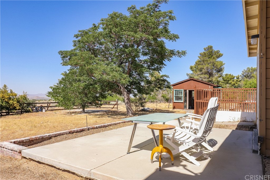 21123 Fort Tejon Road Llano, CA 93544 - Photo 38 of 55 a view of a swimming pool with a patio