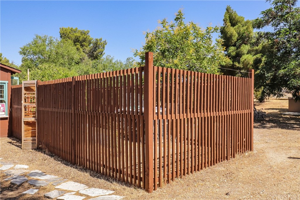 21123 Fort Tejon Road Llano, CA 93544 - Photo 41 of 55 a view of a black gate