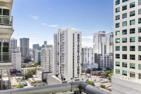 a view of a city with tall buildings