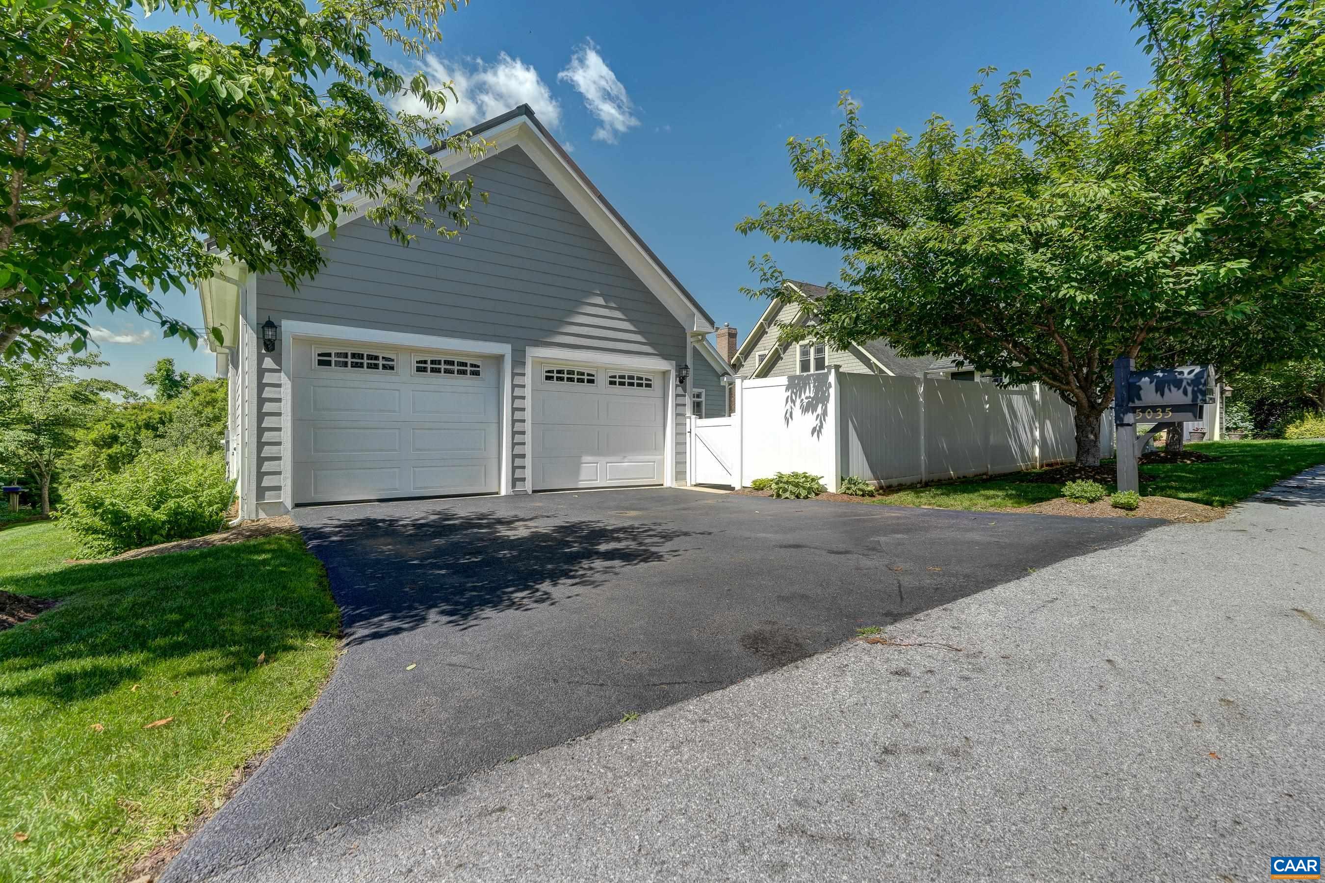 5035 Brook View Road Crozet, VA 22932 - Photo 54 of 57 a front view of a house with a yard and garage