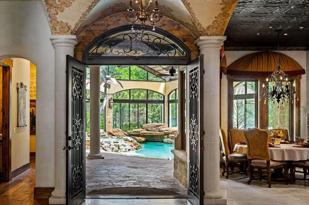 2115 Paradise Rnch Trail McKinney, TX 75071 - Photo 6 of 40 Ornate ironwork doors opening to an indoor pool area