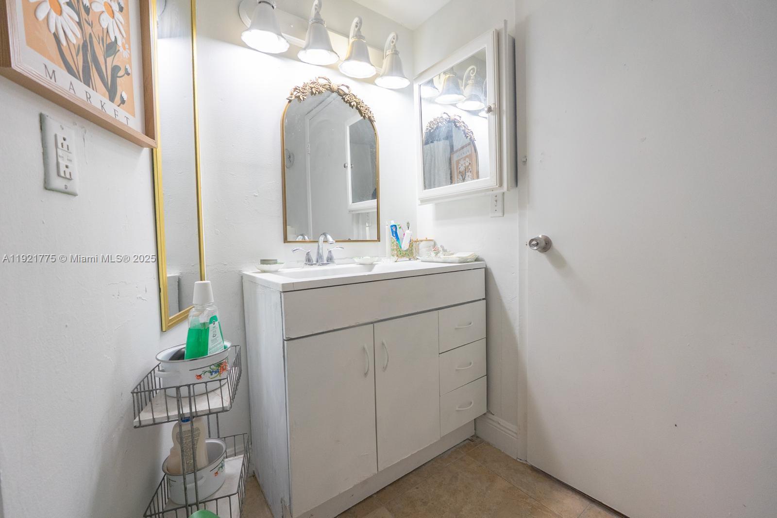 6276 Northwest 186th Street, Unit 112 Hialeah, FL 33015 - Photo 6 of 22 a utility room with dryer and washer