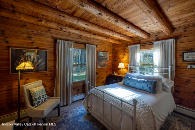 a bathroom with a sink vanity and mirror