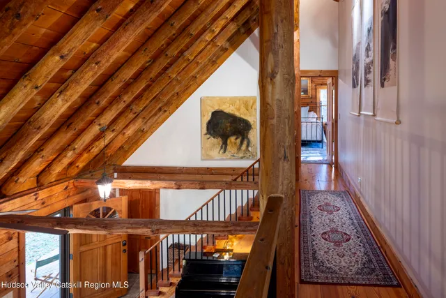 a bedroom with a large bed and a couch