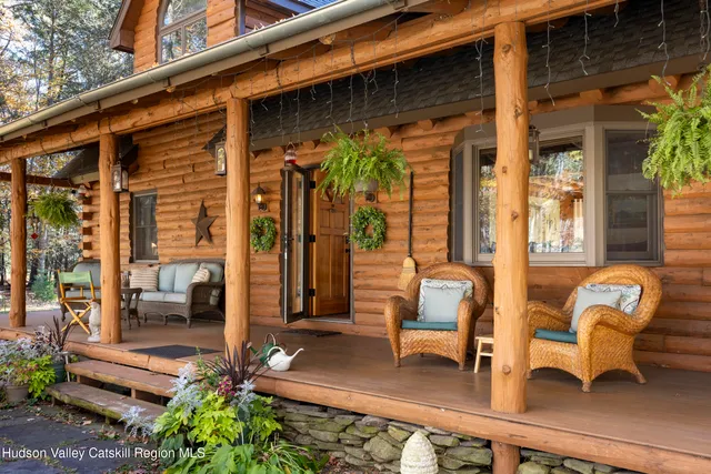 a view of living room with porch and furniture