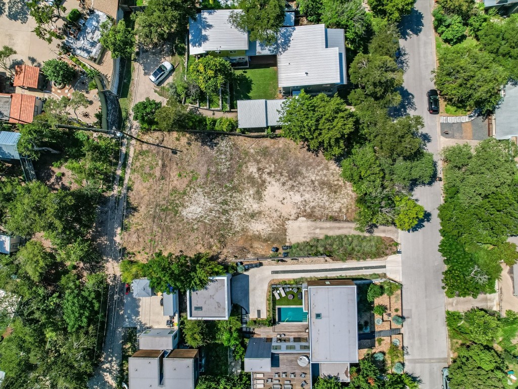 3007 South 4th Street Austin, TX 78704 - Photo 16 of 16 an aerial view of a house with a yard and large trees