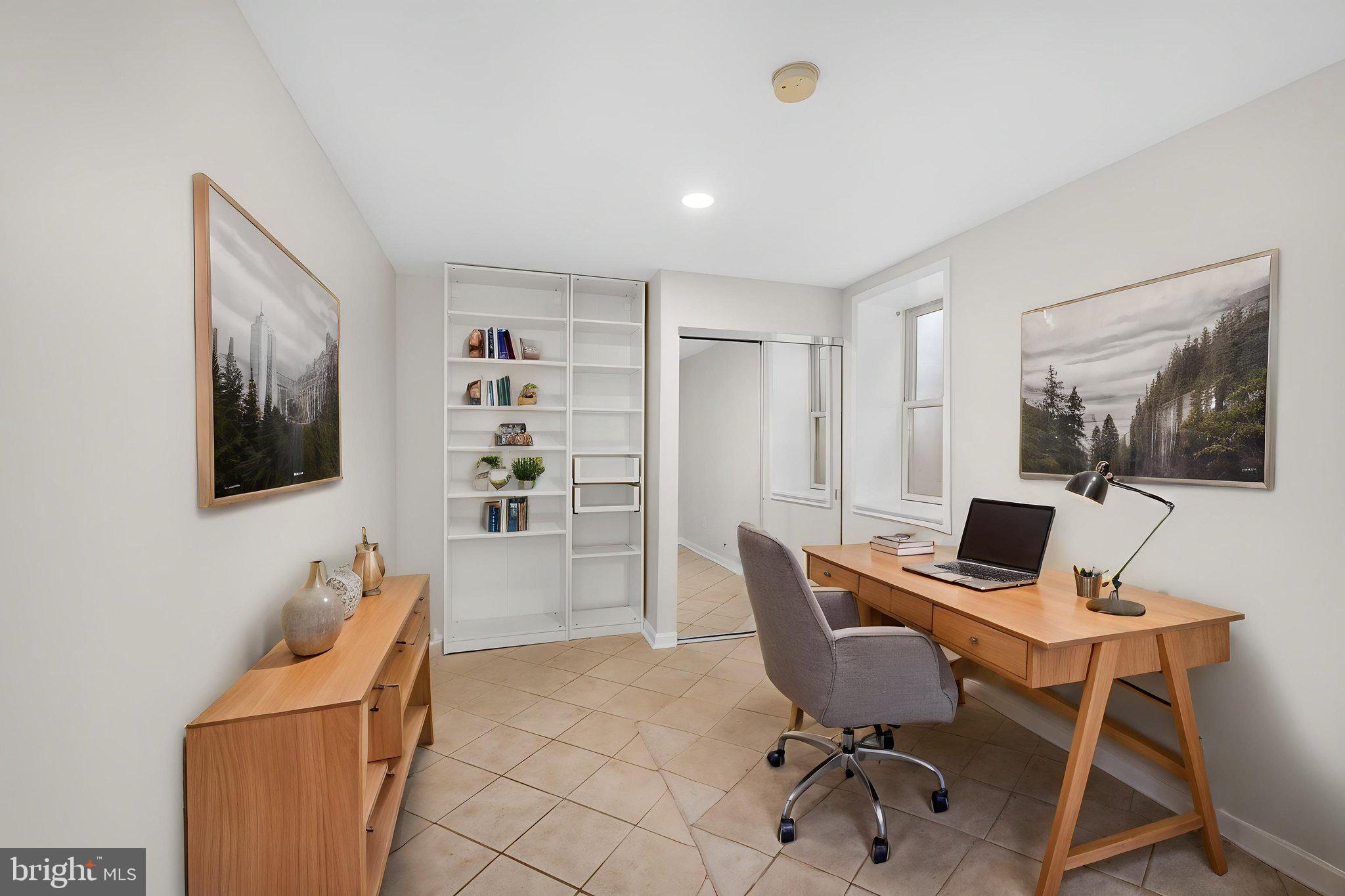 1615 45th Street Northwest Washington, DC 20007 - Photo 26 of 34 a workspace with furniture and a window