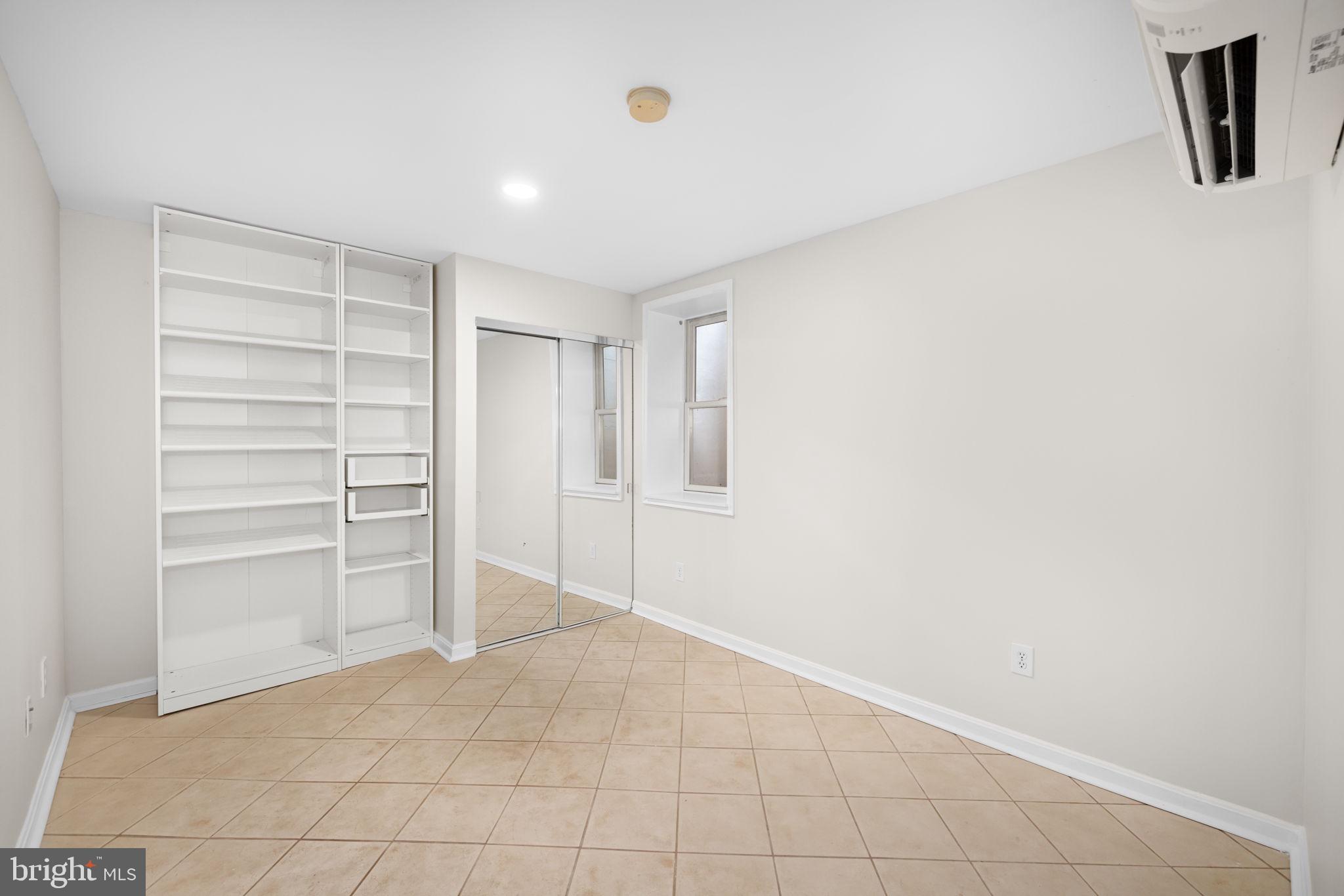 1615 45th Street Northwest Washington, DC 20007 - Photo 27 of 34 a view of an empty room with a closet