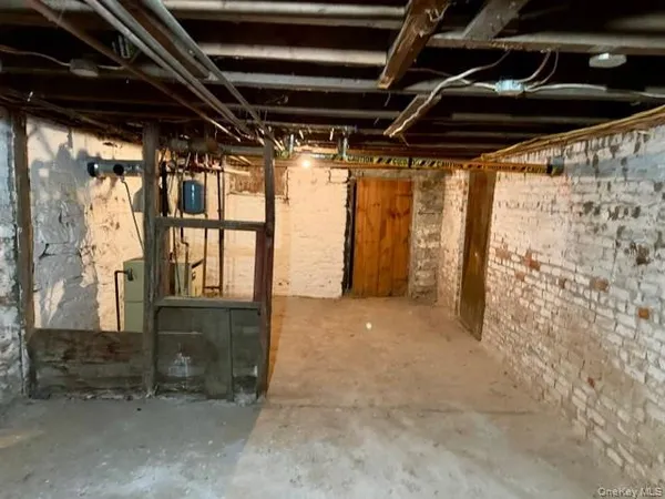 a view of under construction room and car parked