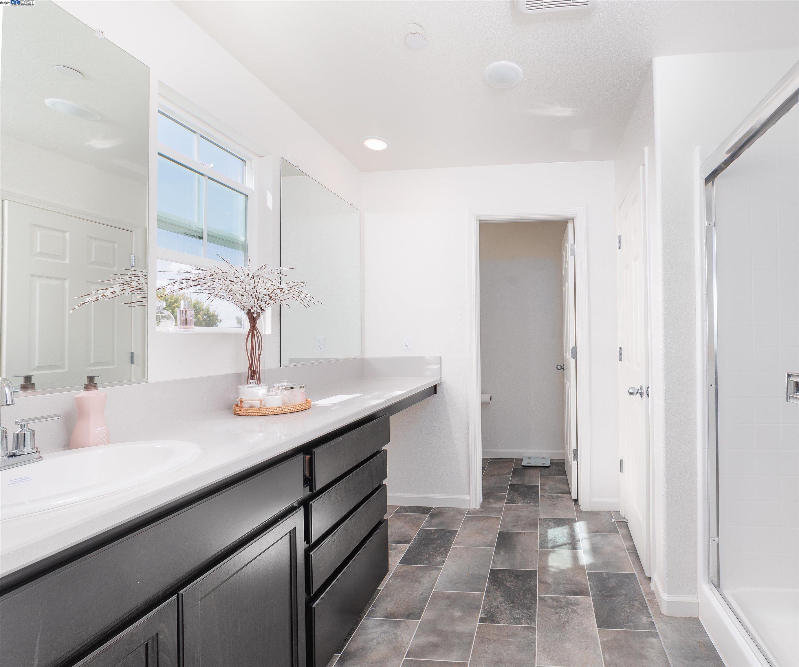 Van Buskirk Stockton, CA 95206 - Photo 12 of 14 a bathroom with a sink and a mirror