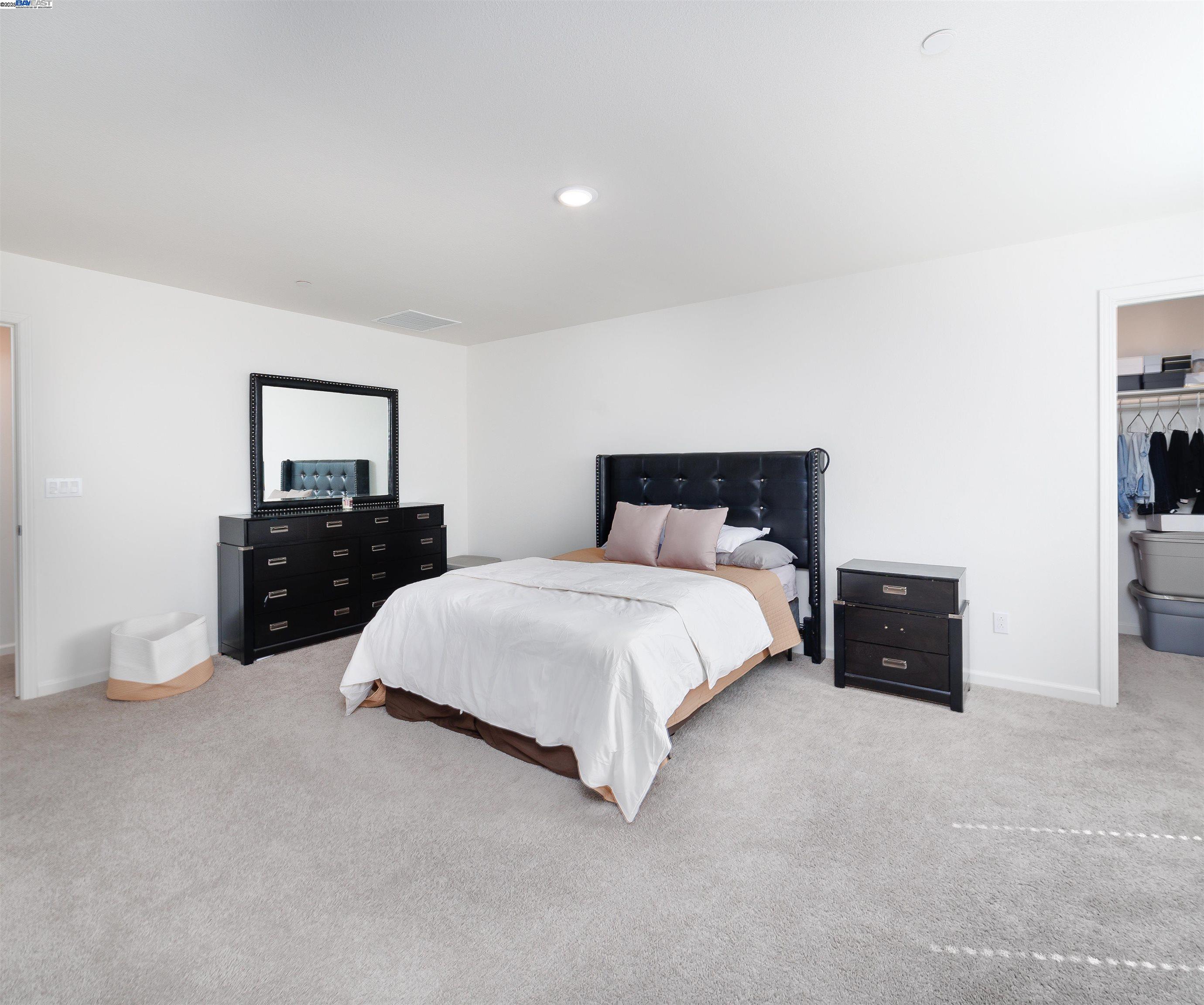 Van Buskirk Stockton, CA 95206 - Photo 14 of 14 a bedroom with bed and window