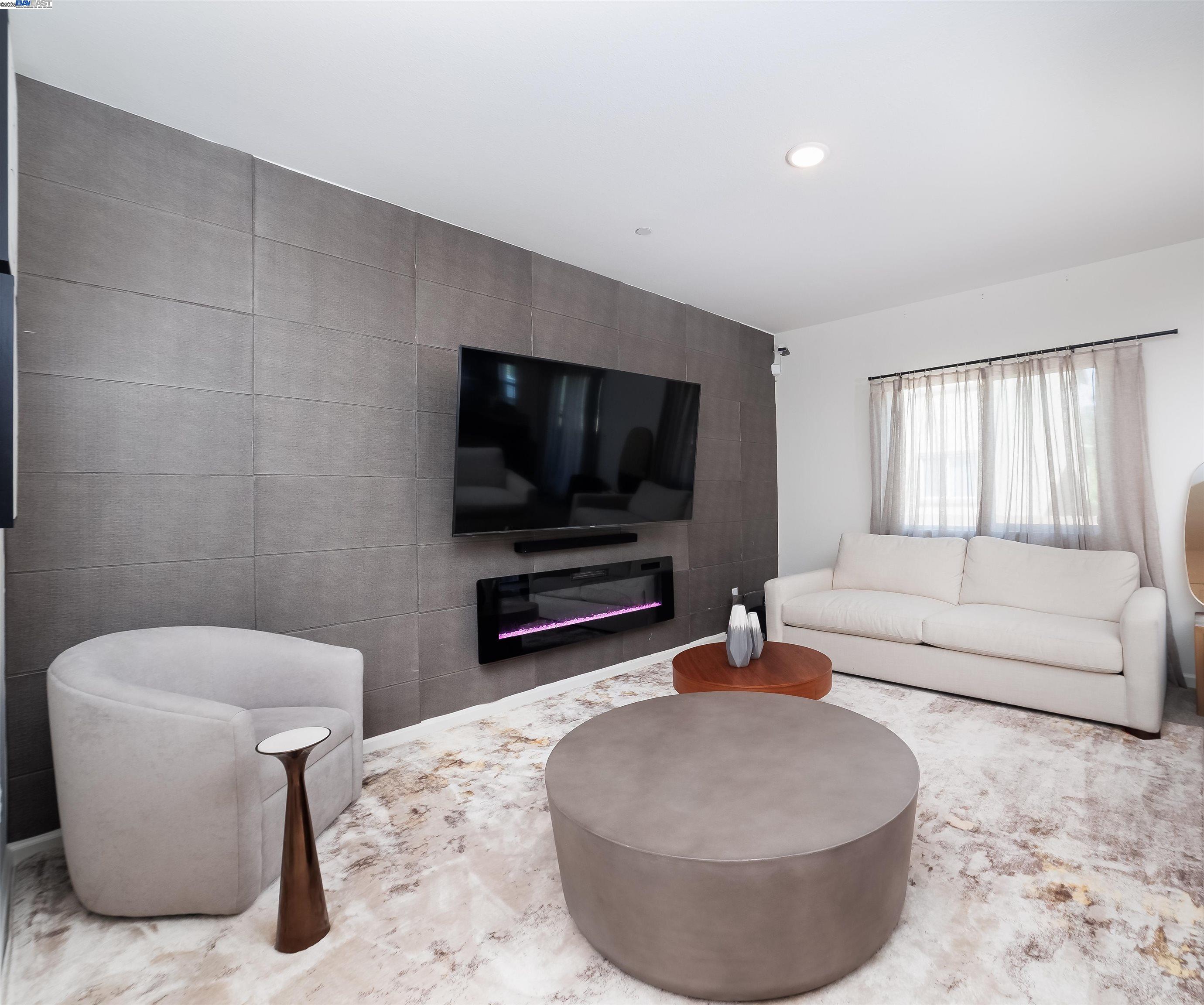 Van Buskirk Stockton, CA 95206 - Photo 3 of 14 a living room with furniture and a flat screen tv