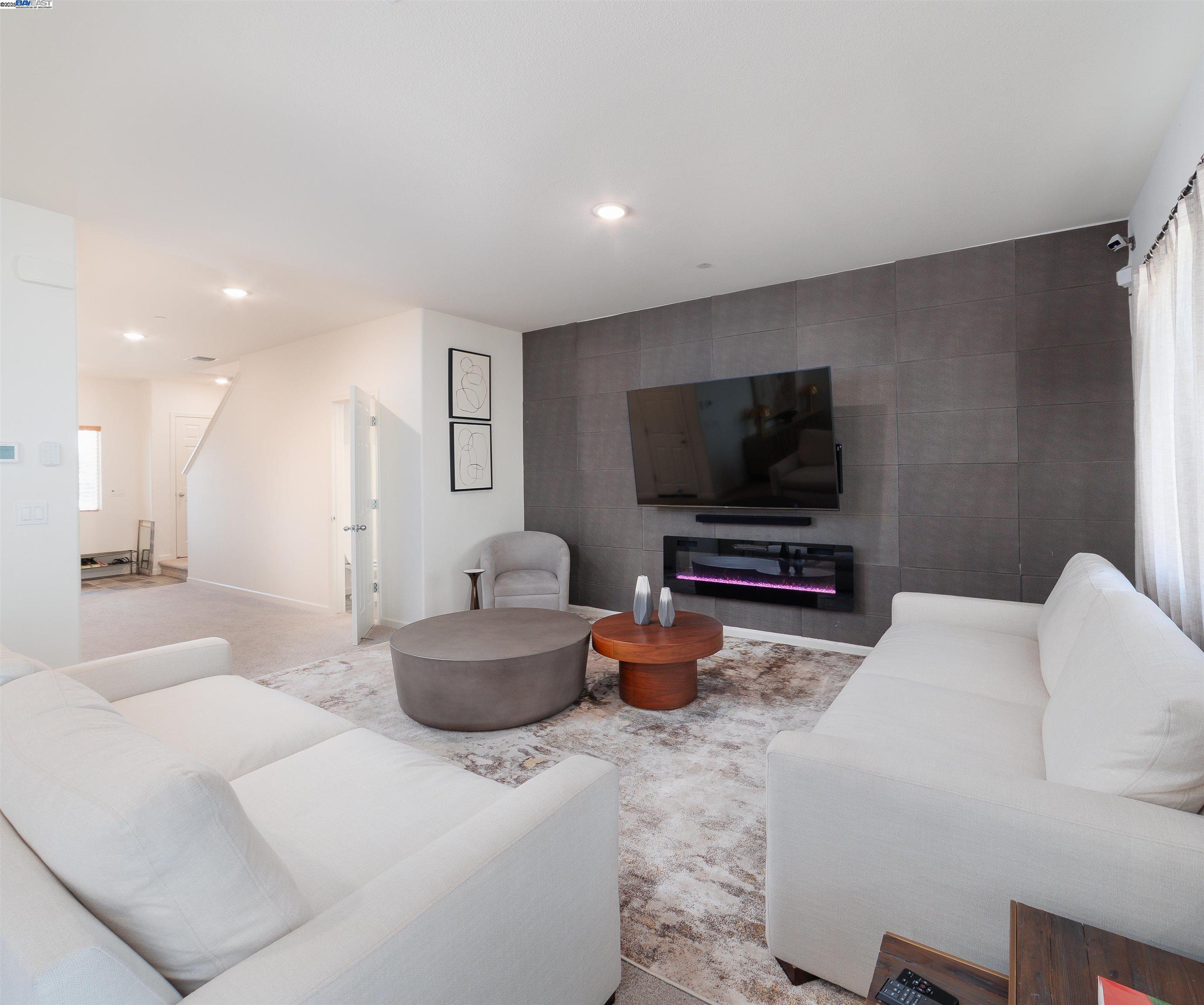 Van Buskirk Stockton, CA 95206 - Photo 4 of 14 a living room with furniture and a flat screen tv