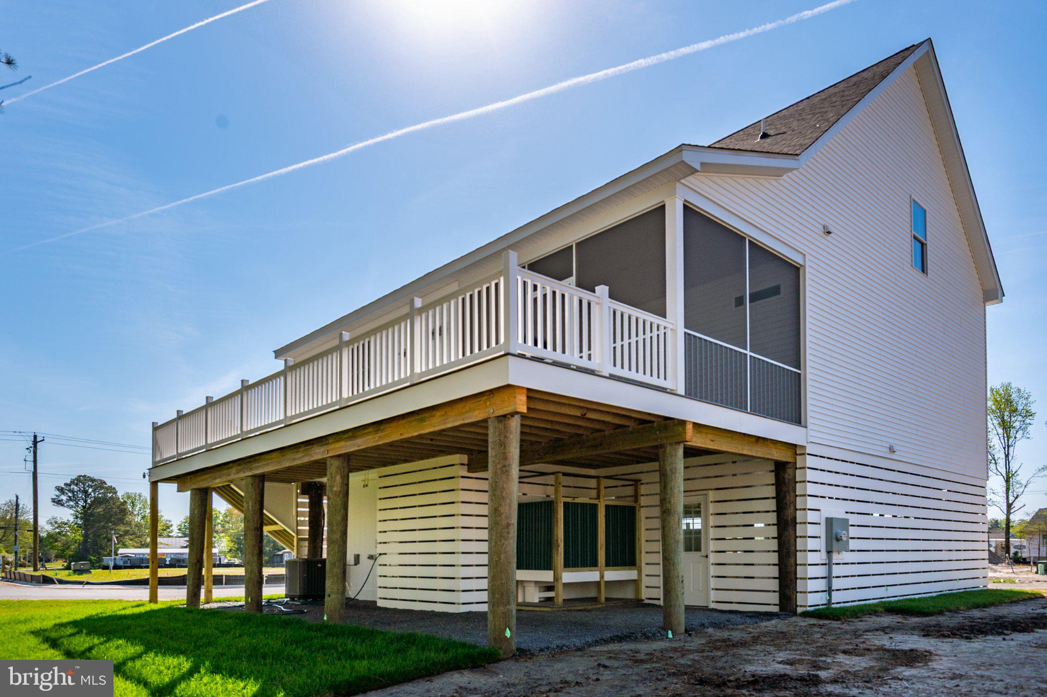 36037 Jackson Street Ocean View, DE 19970 - Photo 47 of 59 Charming coastal retreat with spacious deck.