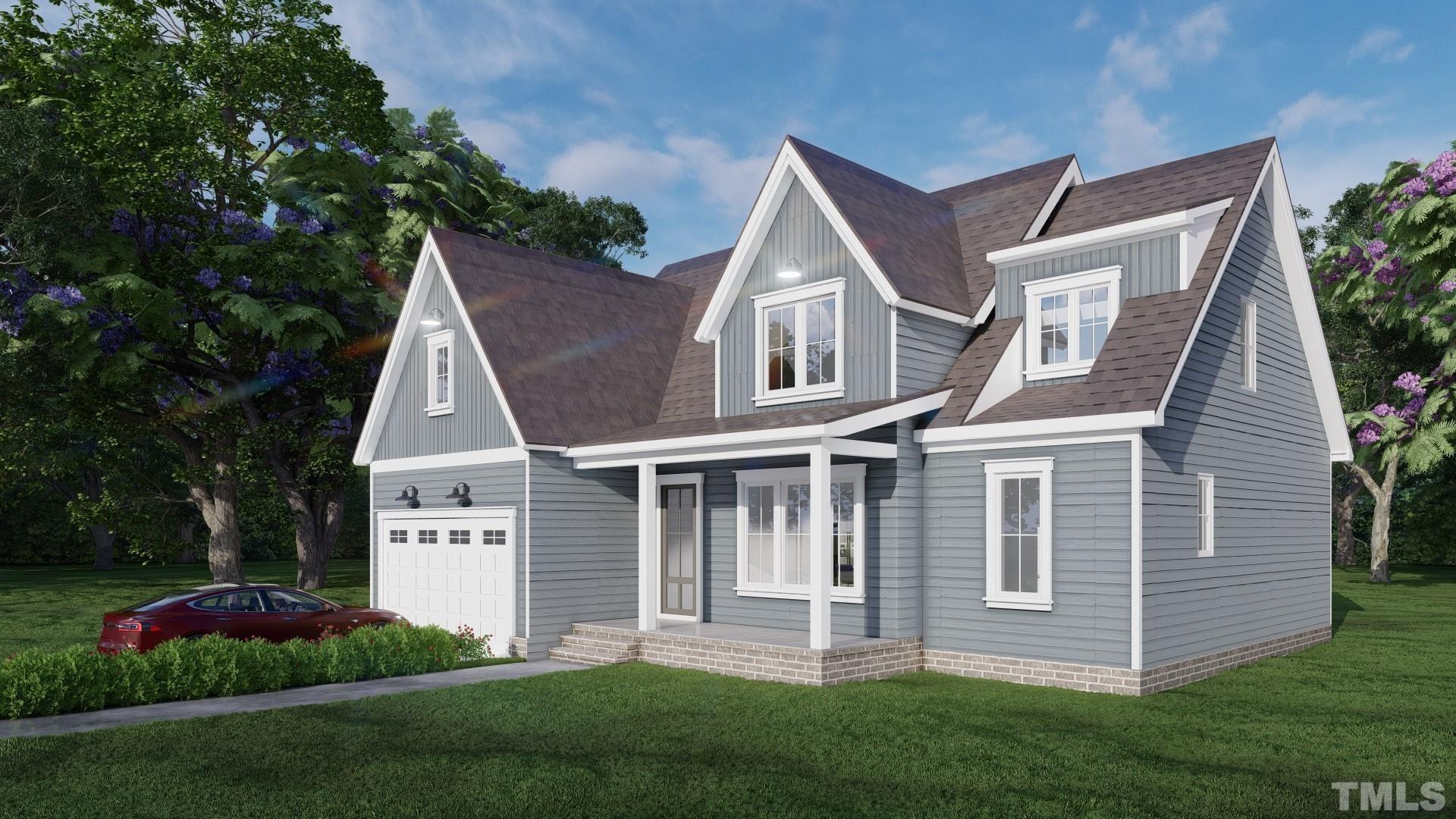 4416 Powell Grv Court Raleigh, NC 27606 - Photo 2 of 5 a front view of a house with a garden and plants