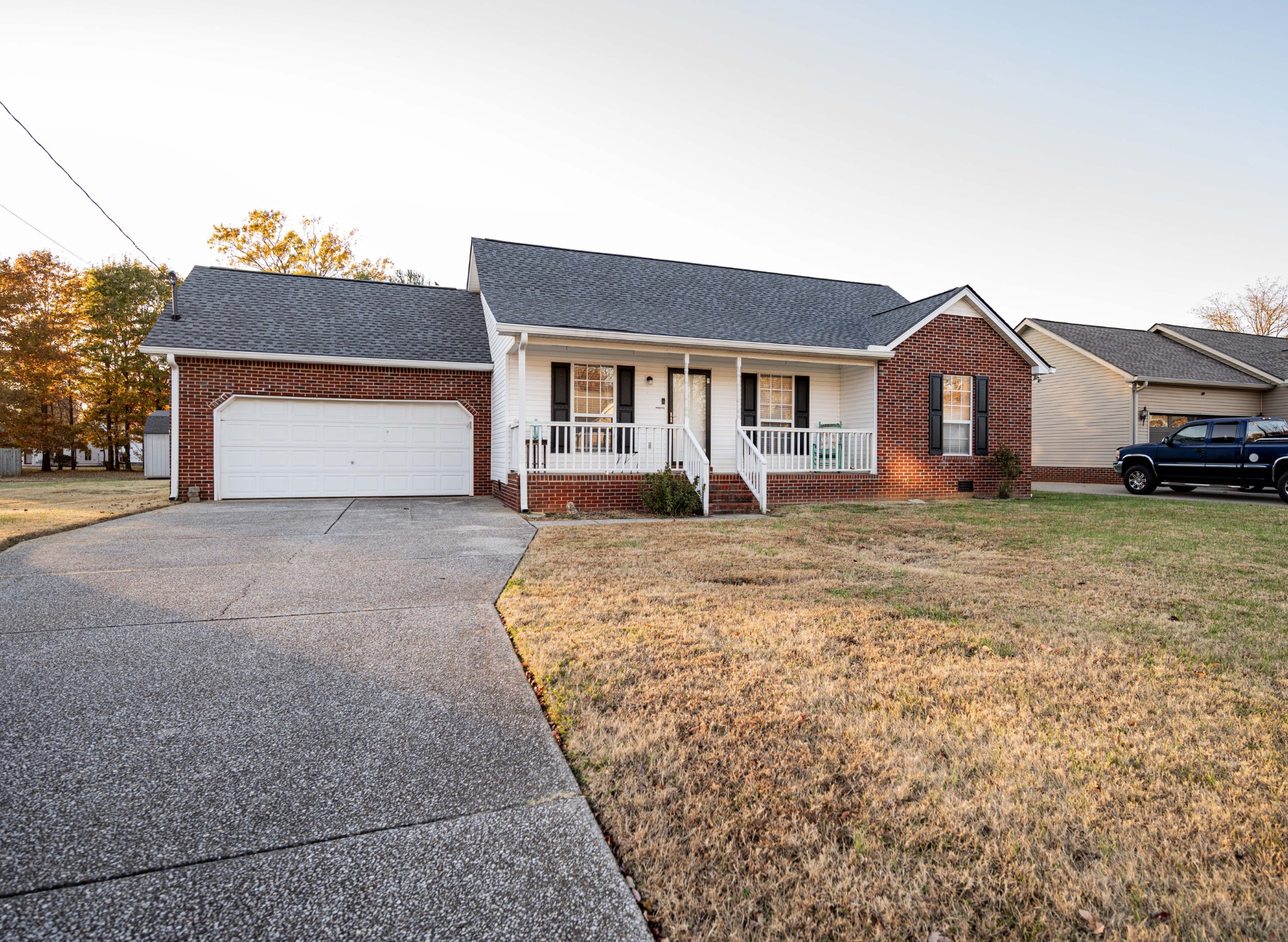 412 Conhocken Court Murfreesboro, TN 37128 - Photo 3 of 23 a front view of a house with a yard and garage