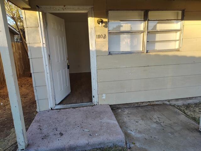 1110 41st Street, Unit B Lubbock, TX 79412 - Photo 1 of 8 a view of front door