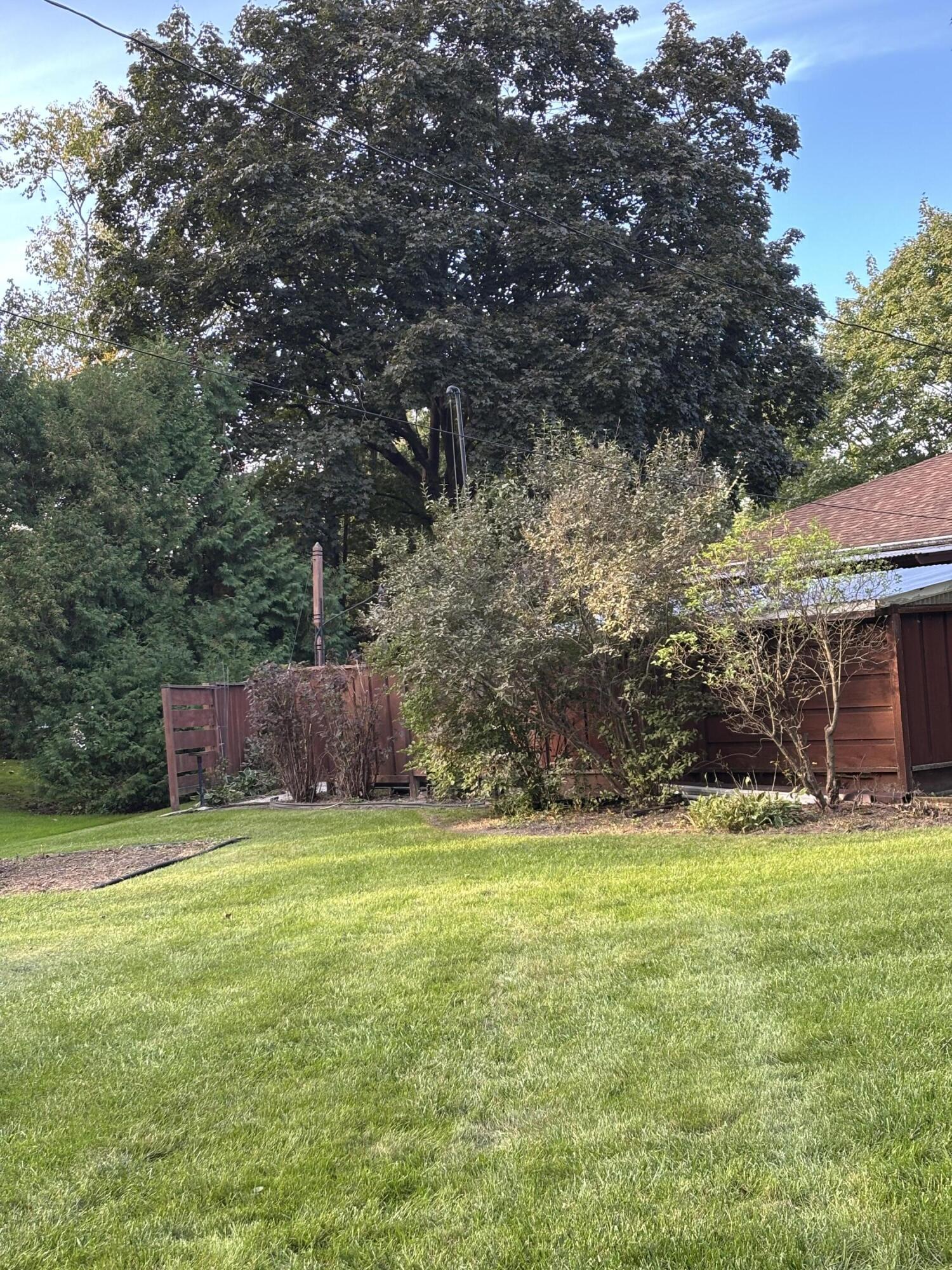 1701 West Donges Bay Road Mequon, WI 53092 - Photo 5 of 29 Rear View