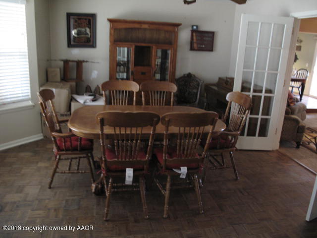 7201 Gainsborough Road Amarillo, TX 79106 - Photo 3 of 14 a view of a dining room with furniture and window