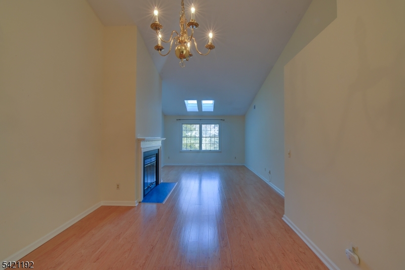 220 Alexandria Way Bernards, NJ 07920 - Photo 11 of 18 wooden floor in an empty room with a window