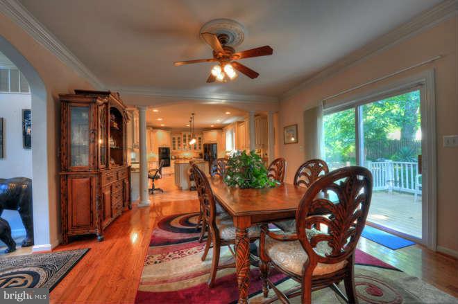 1721 Tacoma Road Edgewater, MD 21037 - Photo 14 of 30 a dining room with furniture and window