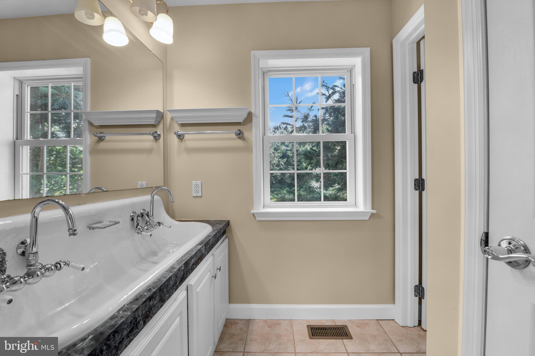 2 Forest Road Mohnton, PA 19540 - Photo 36 of 54 a bathroom with a sink and a mirror