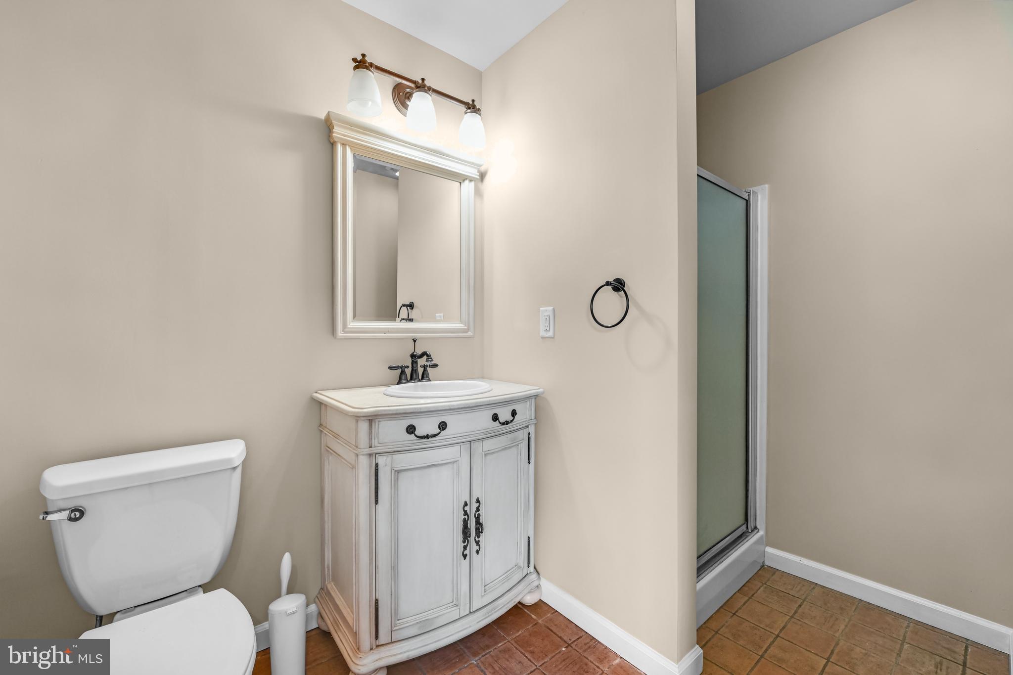 2 Forest Road Mohnton, PA 19540 - Photo 41 of 54 a bathroom with a toilet sink and mirror