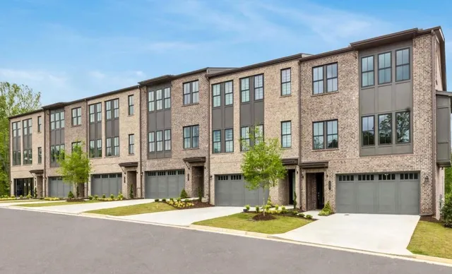 a front view of building with street view