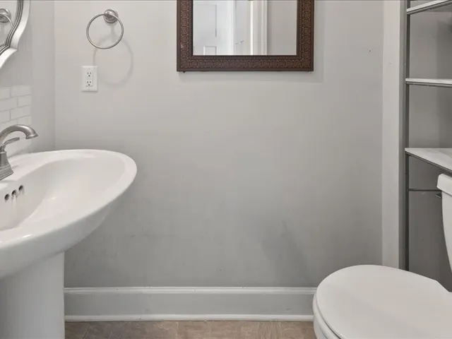 a bathroom with a sink and a toilet