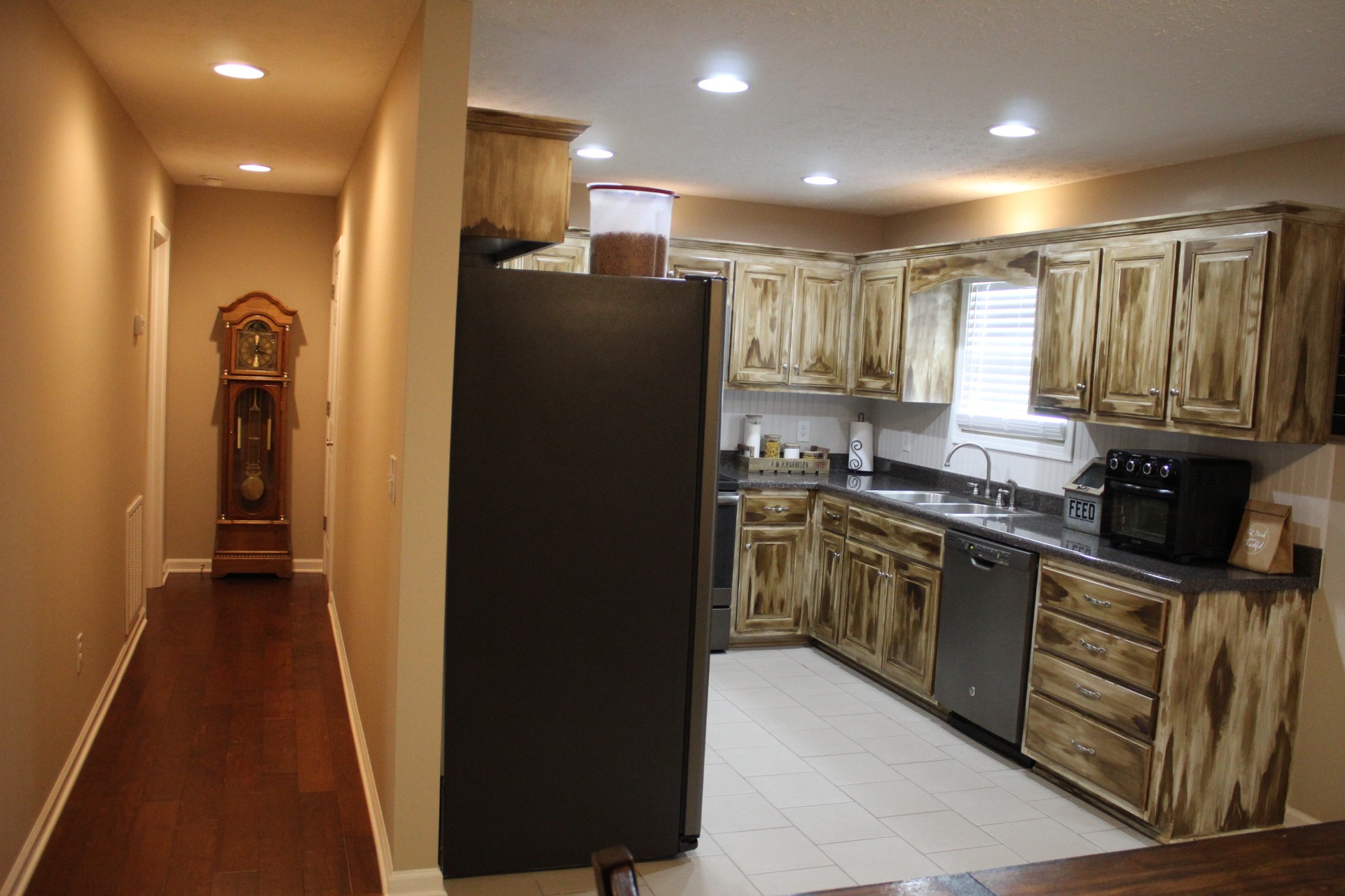 100 Houston Bell Road Manchester, TN 37355 - Photo 19 of 52 a kitchen with stainless steel appliances granite countertop a refrigerator and a sink