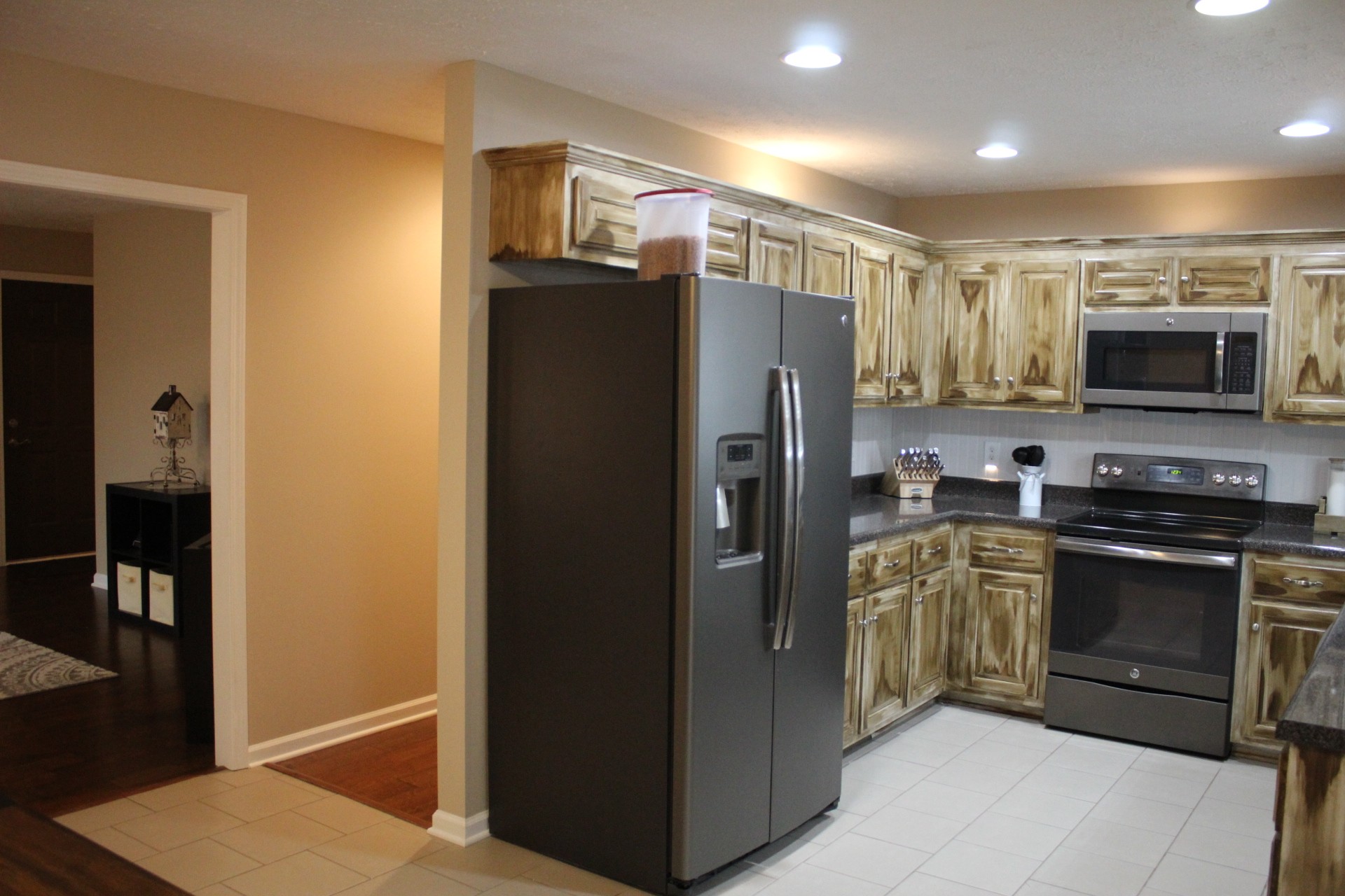 100 Houston Bell Road Manchester, TN 37355 - Photo 20 of 52 a kitchen with stainless steel appliances granite countertop a refrigerator and a stove top oven