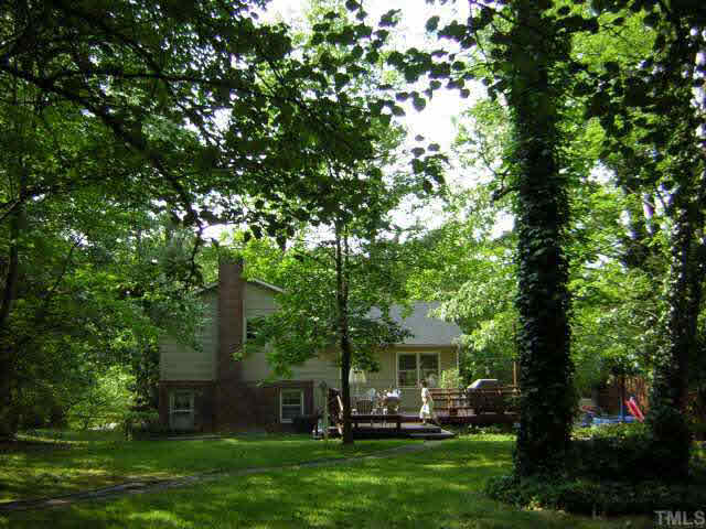 1436 Clermont Road Durham, NC 27713 - Photo 8 of 10 a view of a house with a yard deck and a large tree