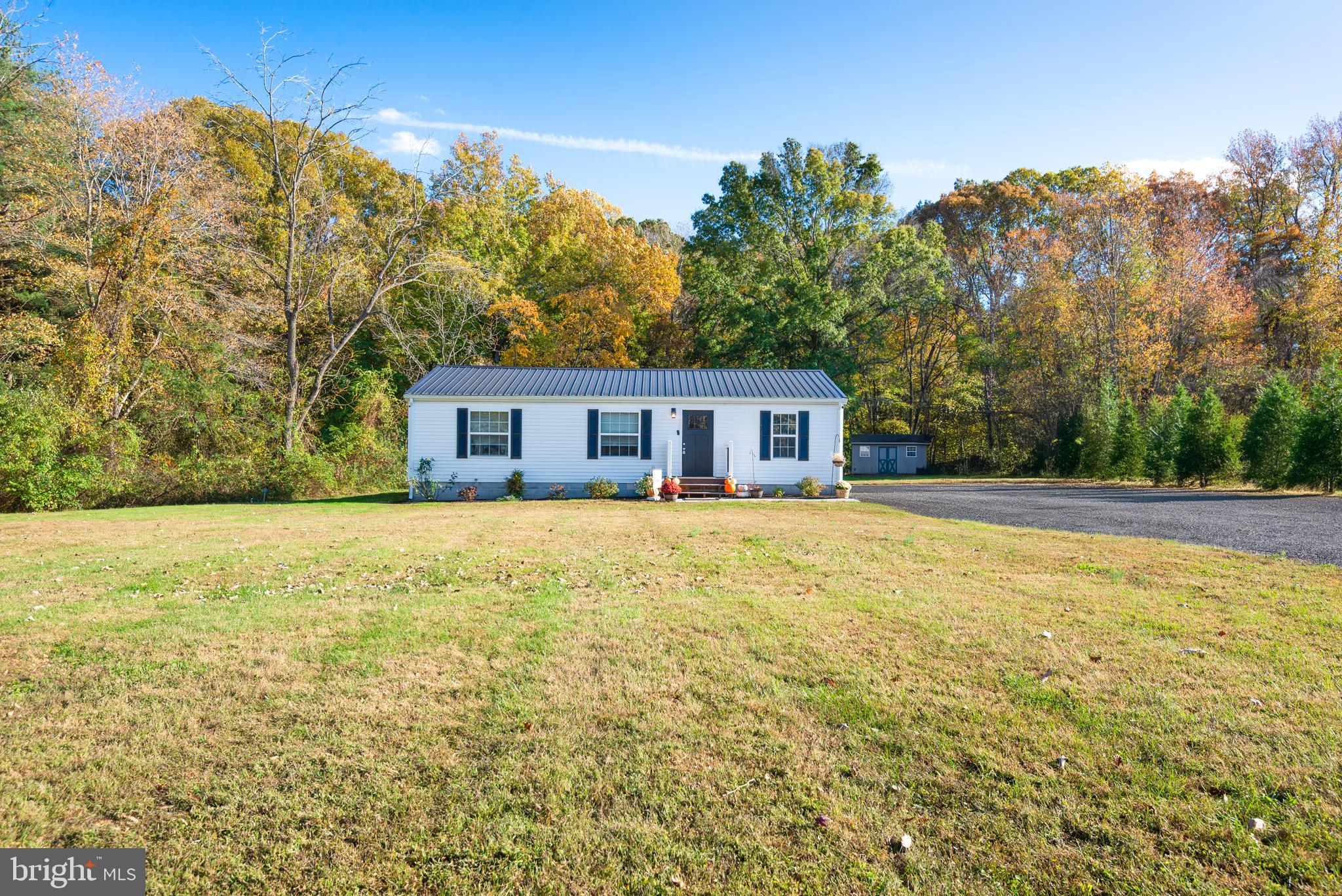 25607 Garey Road Denton, MD 21629 - Photo 2 of 19 a house with trees in front of it
