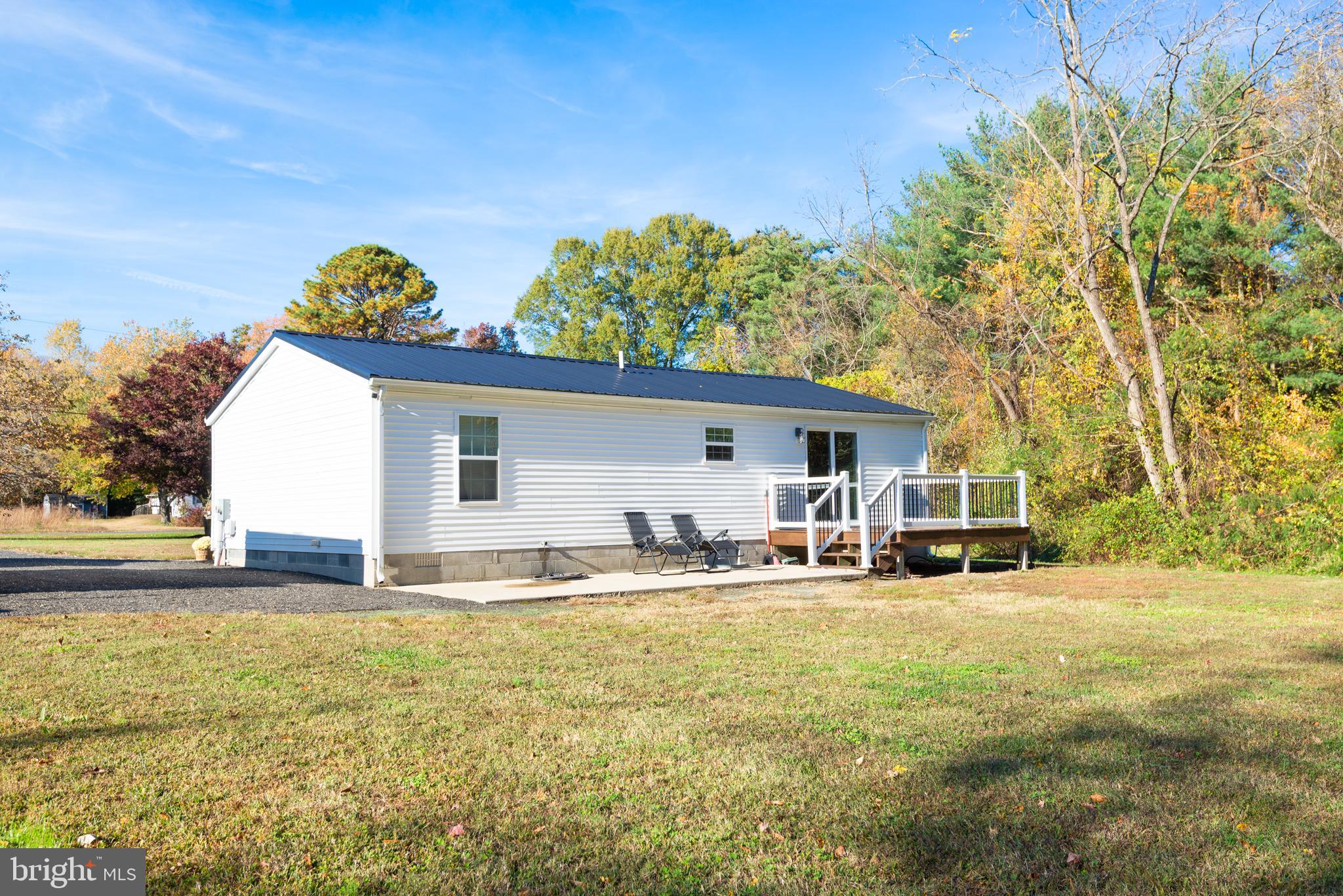 25607 Garey Road Denton, MD 21629 - Photo 3 of 19 a view of a house with backyard and sitting area