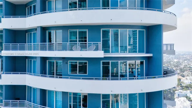 a bathroom with a toilet sink and shower