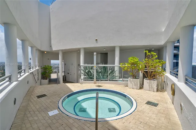 a view of balcony with furniture