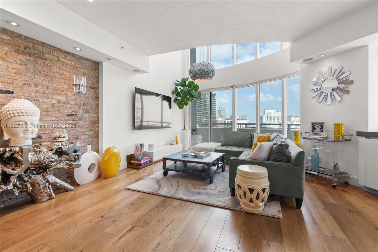 60 Southwest 13th Street, Unit 4616 Miami, FL 33130 - Photo 8 of 55 a living room with fireplace furniture and a wooden floor