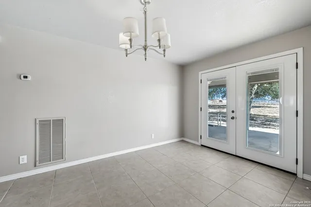 a view of a room with windows