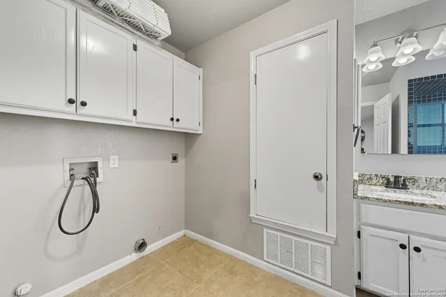 a bathroom with a sink a vanity and a mirror