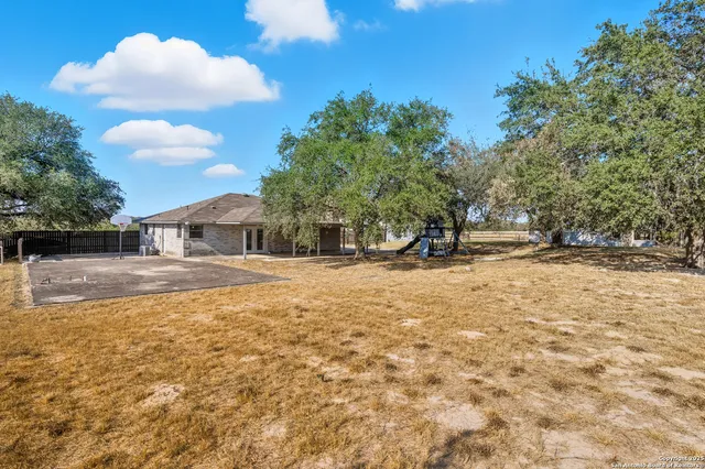 a house view with a outdoor space