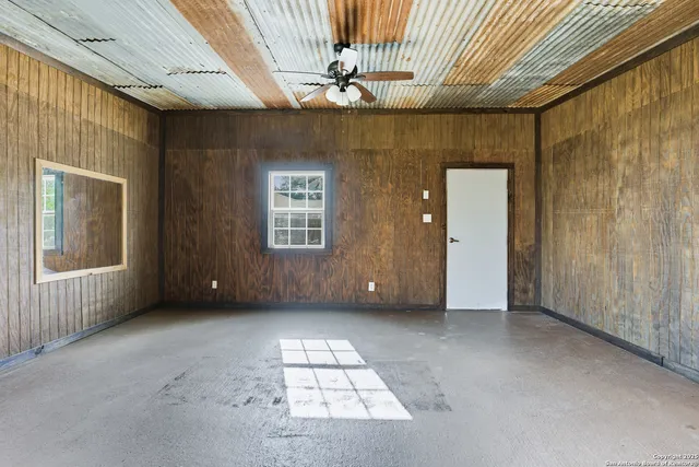 an empty room with windows