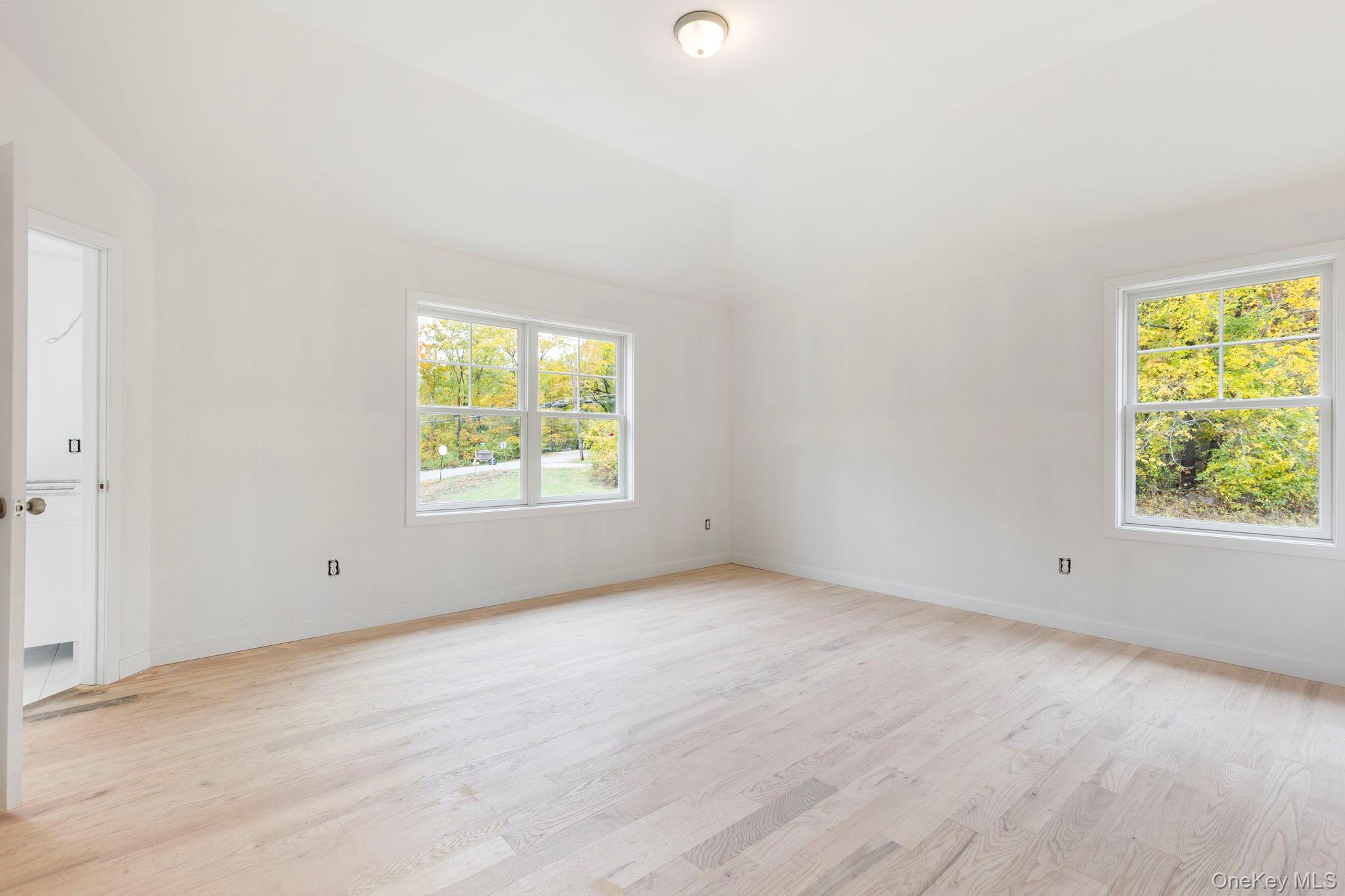73 Farm To Market Road Brewster, NY 10509 - Photo 10 of 23 This to be built home will feature a primary bedroom with walk in closet-Picture depicts previously built similar home.Subject to change