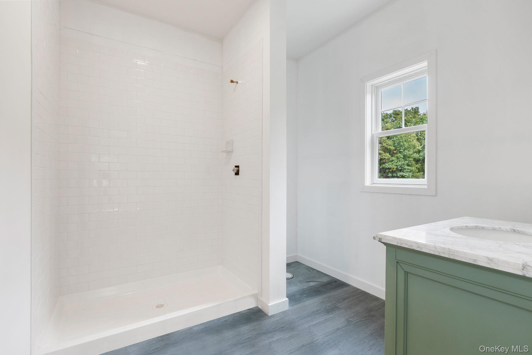 73 Farm To Market Road Brewster, NY 10509 - Photo 15 of 23 The lower level when built will have a full bathroom with walk in shower-Picture depicts previously built similar home.Subject to change