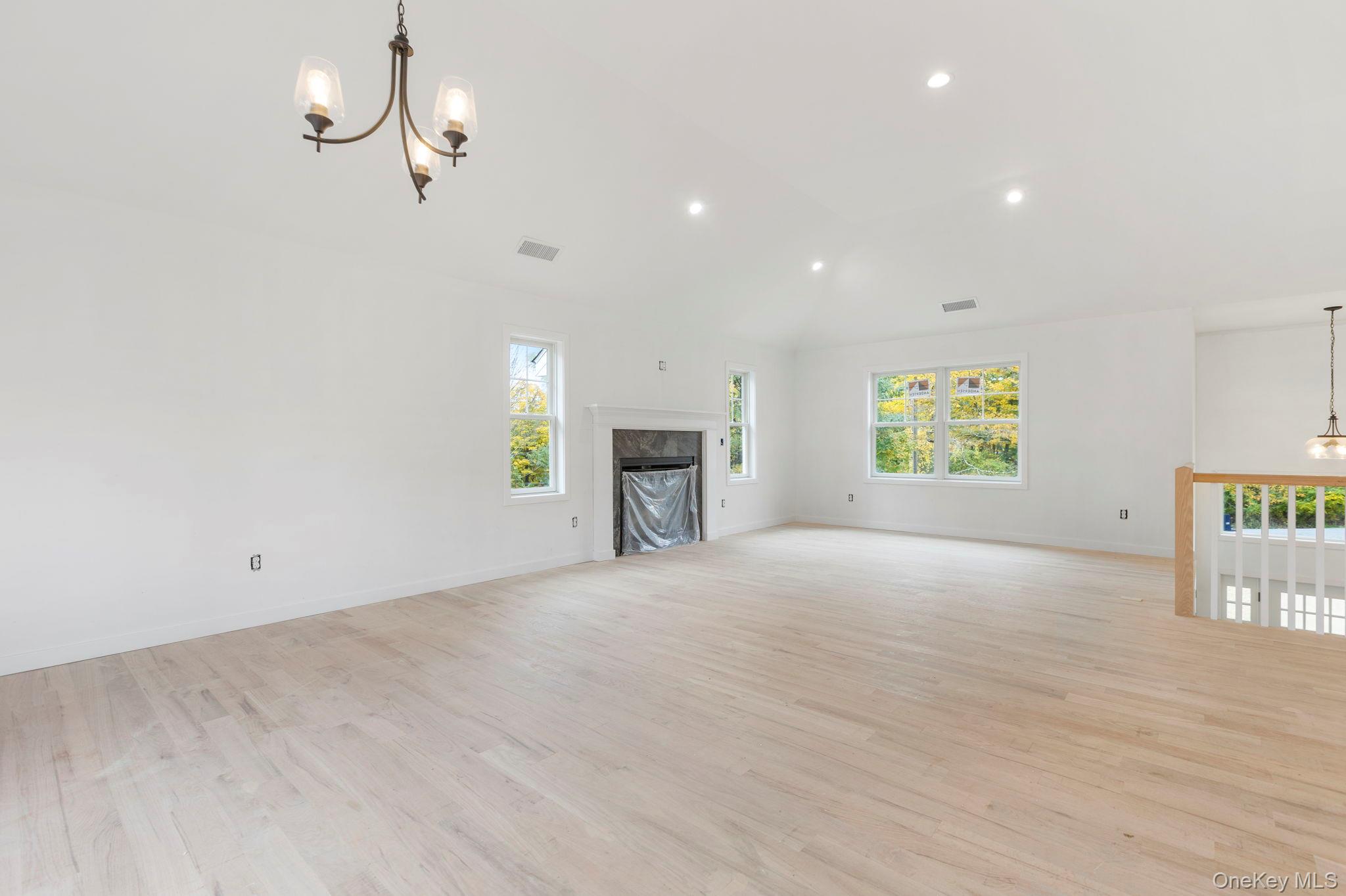 73 Farm To Market Road Brewster, NY 10509 - Photo 4 of 23 To be built-Light infused living spaces with gas fireplace-Picture depicts previously built similar home.Subject to change