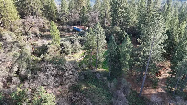 an aerial view of residential house with outdoor space
